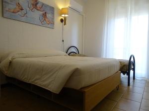 Een bed of bedden in een kamer bij Casa Papapietro