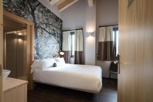 Postel nebo postele na pokoji v ubytování Hotel Rural Sagarlore + 37 fotografií