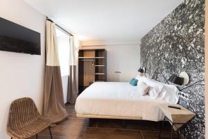 Voodi või voodid majutusasutuse Hotel Rural Sagarlore toas