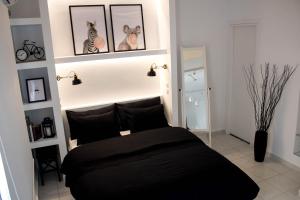 Ένα ή περισσότερα κρεβάτια σε δωμάτιο στο Super Stylish Apartments in Syntagma Square!