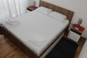 Postel nebo postele na pokoji v ubytování Olimp Lux II