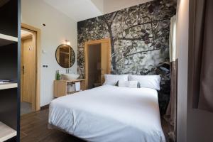 Voodi või voodid majutusasutuse Hotel Rural Sagarlore toas