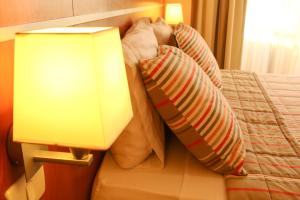 Khu vực ghế ngồi tại Olimpo Hotel & Suites