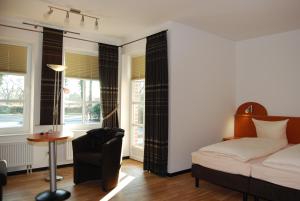 Postel nebo postele na pokoji v ubytování Hotel Waldquelle
