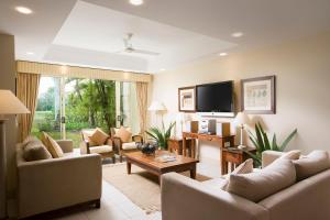 TV o dispositivi per l'intrattenimento presso Paradise Links Resort Port Douglas