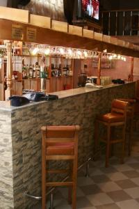 Khu vực lounge/bar tại Hotel Casa de Piatra