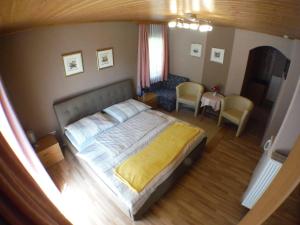 Ένα ή περισσότερα κρεβάτια σε δωμάτιο στο Ferienparadies Gutounik