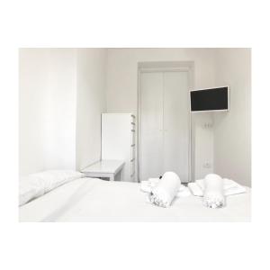 Posteľ alebo postele v izbe v ubytovaní Secret Room Naples