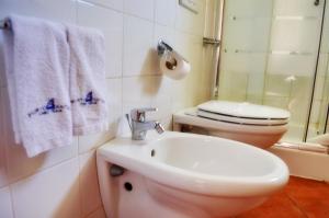 Koupelna v ubytování Porto Antigo Hotel BB