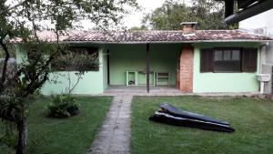 Afbeelding uit fotogalerij van Casa, quarto inteiro e quarto compartilhado Juréia in Juréia