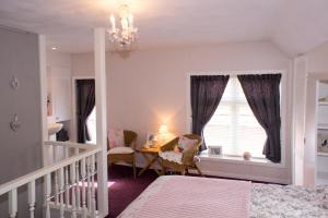 Postel nebo postele na pokoji v ubytování Beleef het Noorden