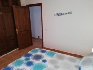 A bed or beds in a room at mirador del roque 2
