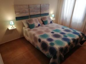A bed or beds in a room at mirador del roque 2