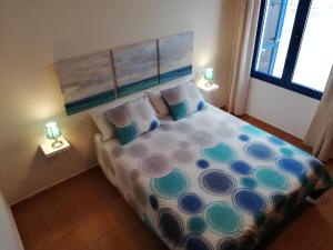 A bed or beds in a room at mirador del roque 2