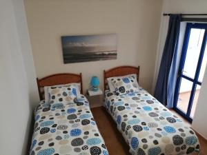 A bed or beds in a room at mirador del roque 2