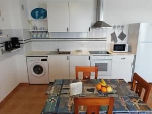 A kitchen or kitchenette at mirador del roque 2