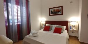 Postel nebo postele na pokoji v ubytování B&B Il Campanile