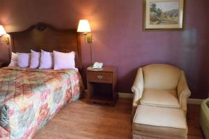 Cama o camas de una habitación en Delux Inn
