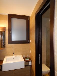 Koupelna v ubytování Arena Luxury Suite