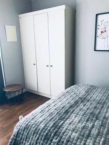 Postel nebo postele na pokoji v ubytování City Centre Georgian Apartment