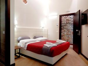 Postel nebo postele na pokoji v ubytování Arena Luxury Suite