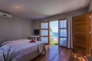 A bed or beds in a room at Sunset Mancora Még 37 kép