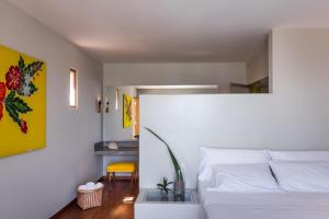 A bed or beds in a room at Sunset Mancora