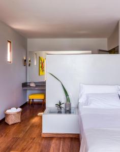 A bed or beds in a room at Sunset Mancora