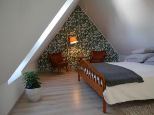 Postel nebo postele na pokoji v ubytování Kunst und Meer