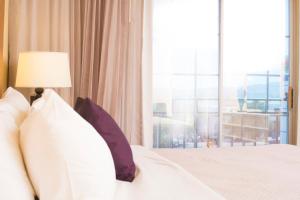 Postel nebo postele na pokoji v ubytování iStay Hotel Ciudad Juarez