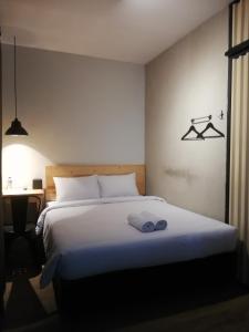 Voodi või voodid majutusasutuse PINX'S HOSTEL toas