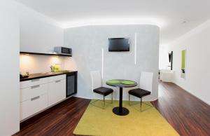 Kuchyň nebo kuchyňský kout v ubytování Hotel Barth