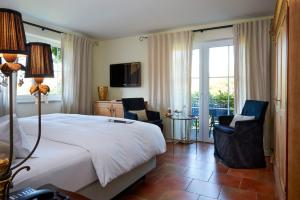 TV a/nebo společenská místnost v ubytování Hotel VILLINO