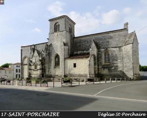 an old church on the side of a street at Chambre au bruand in Saint-Porchaire