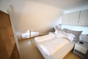 Postel nebo postele na pokoji v ubytování BraMy Apartments The LUX View