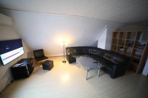 TV a/nebo společenská místnost v ubytování BraMy Apartments The LUX View