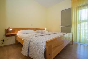 Postel nebo postele na pokoji v ubytování Holiday Home Pelegrin