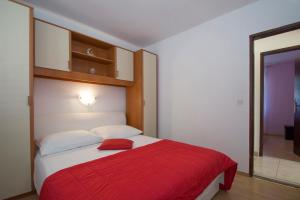 Postel nebo postele na pokoji v ubytování Holiday Home Pelegrin