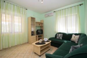 TV a/nebo společenská místnost v ubytování Holiday Home Pelegrin