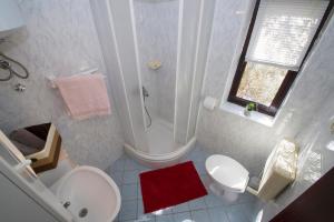 Koupelna v ubytování Holiday Home Pelegrin