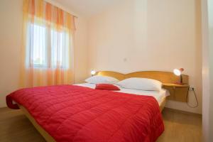 Postel nebo postele na pokoji v ubytování Holiday Home Pelegrin
