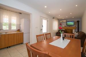 TV a/nebo společenská místnost v ubytování Holiday Home Pelegrin