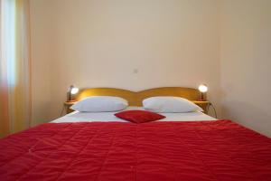 Postel nebo postele na pokoji v ubytování Holiday Home Pelegrin
