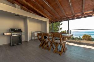 Η κουζίνα ή μικρή κουζίνα στο Apartments Matko's Oasis