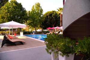 Bazén v ubytování Mendos Garden Exclusive Hotel Fethiye nebo v jeho okolí