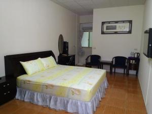 Postel nebo postele na pokoji v ubytování Kai Tai B&B