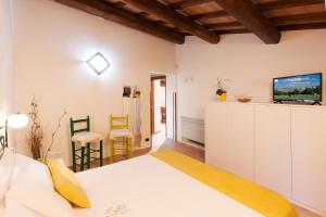 A bed or beds in a room at FicOlivo