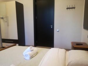 Postelja oz. postelje v sobi nastanitve Guest House Kakheti