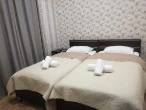 Postelja oz. postelje v sobi nastanitve Guest House Kakheti