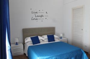 A bed or beds in a room at Sunset House